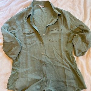Woman’s green blouse